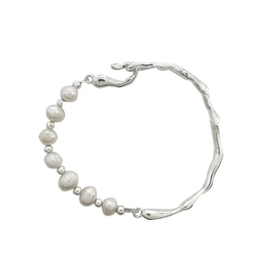 Elegant baroque freshwater pearl bracelet with fluid silver branch-like metal band