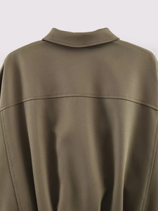 Detailed back view of a retro bomber jacket showing precise shoulder stitching and collar