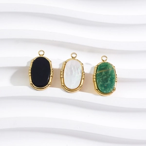 French style gold-framed oval gemstone pendants in black, white pearl, and green stone