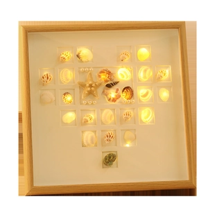DIY shell heart light box with wooden frame and warm LED starfish ocean decor