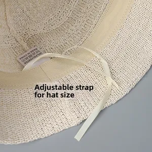 Detail of knit sun hat interior with adjustable drawstring and absorbent sweatband