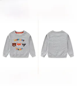Close-up of Woodland Friends embroidery and animal patches on gray boys' sweatshirt