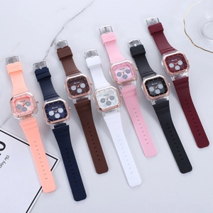 Macro shot of colorful square quartz watches with silicone straps in seven vibrant colors