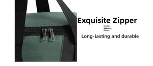 Detailed view of the durable dual zipper design on a dark green insulated lunch bag