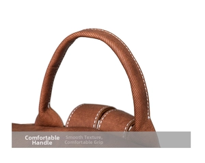 Close-up of brown textured fabric handle with white precision stitching on backpack
