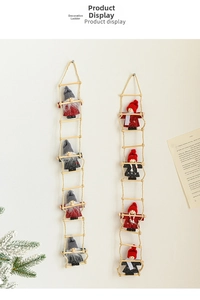 Detailed view of handmade felt Santas climbing on rope ladders for Christmas wall decor