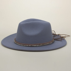 Detail of grey-blue wool fedora featuring a brown braided band with metallic bead accents