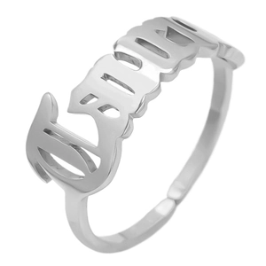 Detailed macro view of the silver Libra zodiac sign open ring in gothic lettering