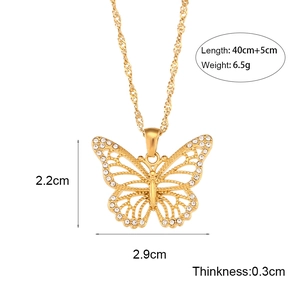 Elegant gold butterfly pendant necklace with white zircon on a water wave chain for women