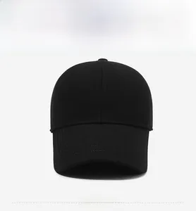 Close-up of black baseball cap with high-density 3D VISITOR embroidery and stitching