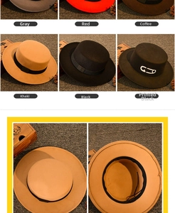 Detail view of colorful wool felt boater hats with flat tops and decorative ribbon bands