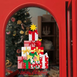 Detail of Christmas gift box stack window sticker on glass door with Merry Christmas text