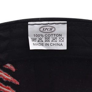 Detail of 100% cotton wash label and fine stitching inside the black tiger baseball cap