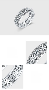 Detailed view of S925 sterling silver daisy ring featuring prong-set 5A cubic zirconia