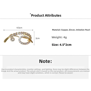 Détails de broche dorée avec zircons et perle, dimensions 4,5 par 2 cm