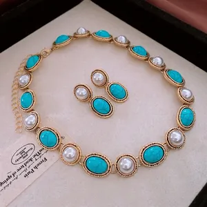 Vintage gold necklace and earring set with turquoise stones and white pearls