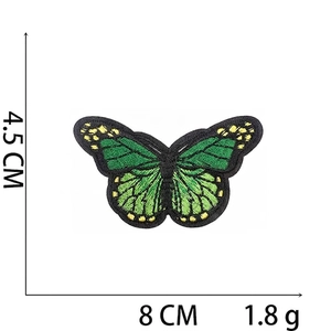 Detailed embroidery view of a green butterfly patch with size 4.5 x 8 cm and 1.8g weight