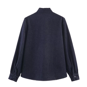 Dark blue denim shirt with ruffled stand collar and buttoned cuffs, back view display