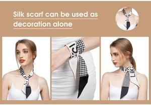 Detail of premium black and white silk scarf with houndstooth and summer letter patterns