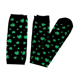 Detail of green shamrock pattern on black knitted over-knee socks and arm warmers set