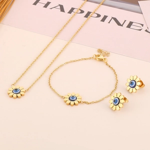 Golden sunflower jewelry set with evil eye center featuring necklace bracelet and earrings