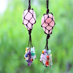 Natural rose quartz heart pendants with bohemian hand-woven nets and colorful raw stone tassels
