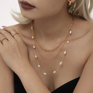 Three-layer stacked necklace set with golden paperclip chain and natural freshwater pearl