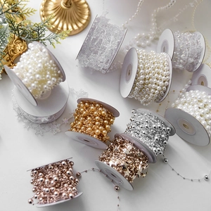 Christmas pearl bead chain reels in gold and silver for festive holiday tree decoration