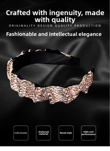 Macro detail of luxury baroque headband with sparkling champagne rhinestones and pleats