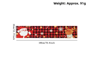 Detailed view of Christmas table runner with Santa and reindeer pattern in red and black plaid