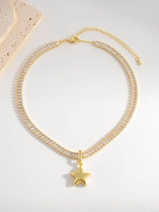 Close-up of gold star pendant necklace with rectangular zircon inlay and adjustable chain