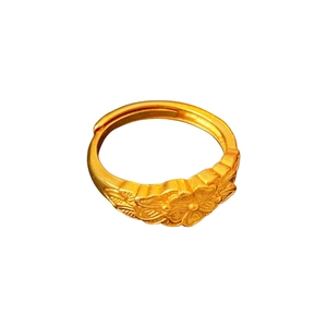 Vintage gold adjustable ring featuring a detailed triple floral relief pattern on white background