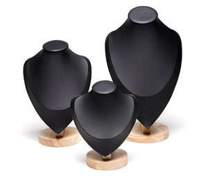 Set of 3 black leather necklace display busts with wood base for jewelry presentation