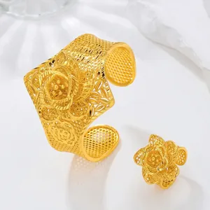 Gold-plated hollow flower bangle and ring set with intricate Dubai bridal rose design