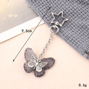 Creative resin butterfly keychain with silver star clasp for bags or car keys, 9.5cm long