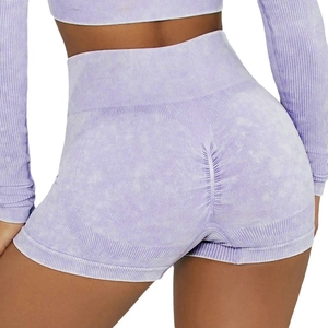 High-waist light purple scrunch butt yoga shorts with acid wash texture in side rear view