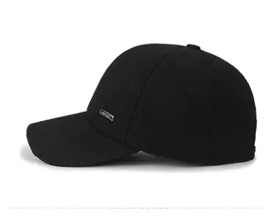 Detail view of the black wool baseball cap side with SPORT metal logo decoration