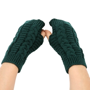 Warm green knitted fingerless gloves with cable knit pattern for women in autumn and winter