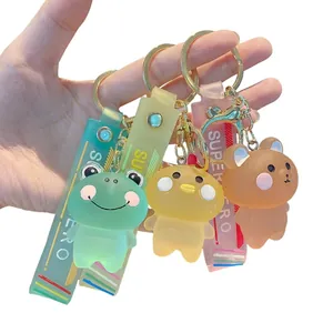 Détail des porte-clés animaux mignons avec ours, grenouille et dragonne en silicone