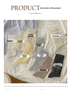 Flat lay of ultra-thin silk ballet socks in nine colors with transparent packaging