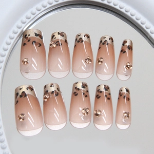 French leopard print coffin press-on nails with champagne rhinestones and gold glitter