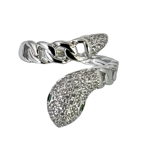Silver snake open ring with white cubic zirconia and green gemstone eyes on white background