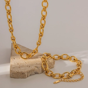 Set di gioielli con collana e bracciale a catena spessa in acciaio dorato 18K