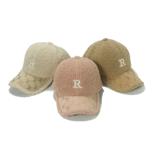 Three lamb wool baseball caps with R embroidery and rhinestone lettering in soft colors