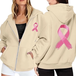 Beige breast cancer ribbon zip up hoodie featuring pink ribbon graphics on front and back