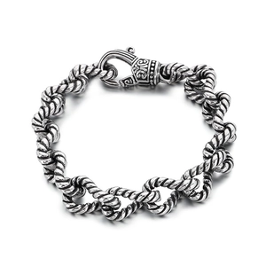 Vintage silver rope chain bracelet for men with baroque lobster clasp on white background