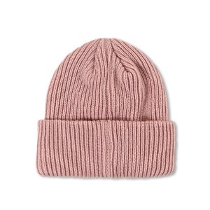 Close-up of pink ribbed knit beanie featuring premium texture and foldable cuff detail