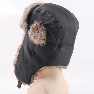 Detail of waterproof black trapper hat with brown faux fur lining and buckle strap