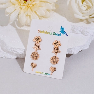 4-pair stainless steel stud earring set with flower and star designs in rose gold finish