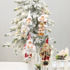 Set of four plush Santa Claus ski figurines for Christmas tree and window display decoration